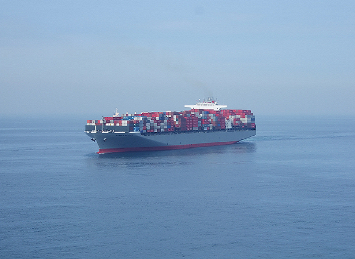 Container ship in a sea passage